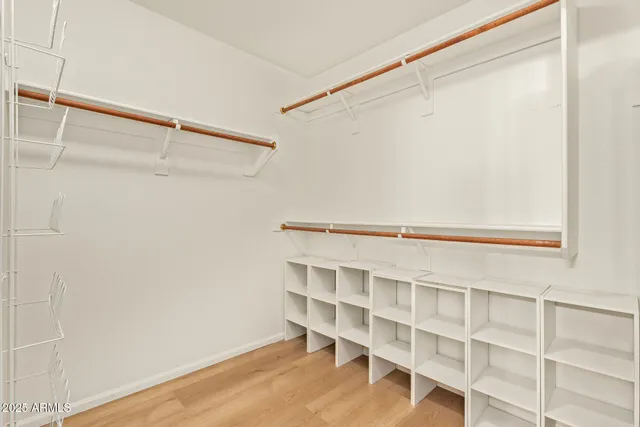 a view of an empty walk in closet