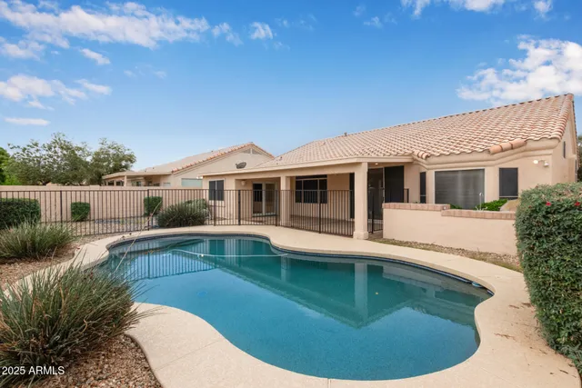 a view of a house with a swimming pool