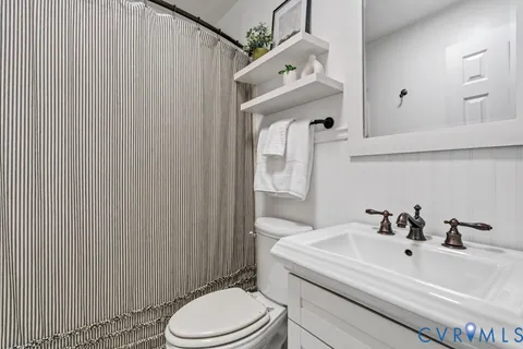 a view of a chairs and table in the patio