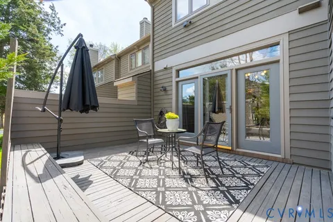 an aerial view of a houses with a lake view