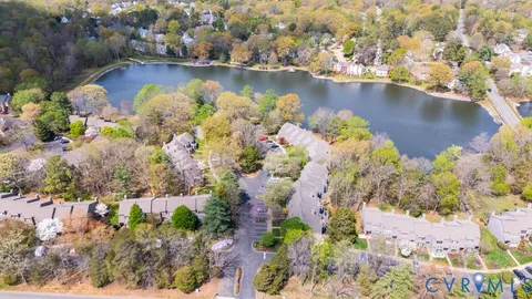 a view of a lake with a house