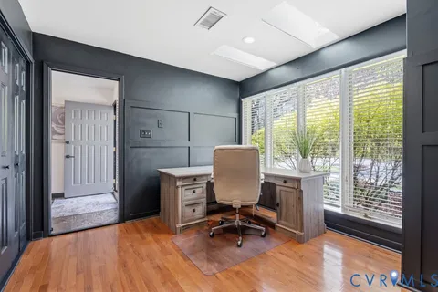 a kitchen with stainless steel appliances a sink and cabinets