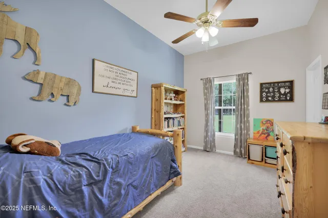 a bathroom with a bathtub and a window