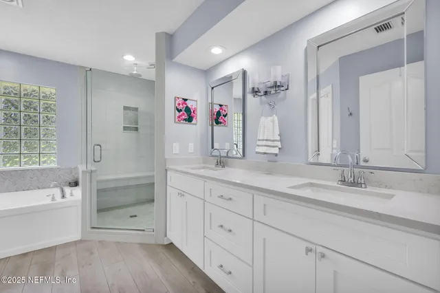 a view of a patio with a table and chairs