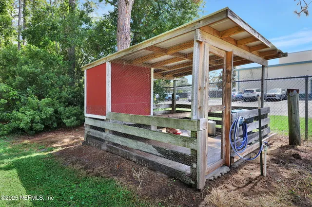 a backyard of a house with lots of green space