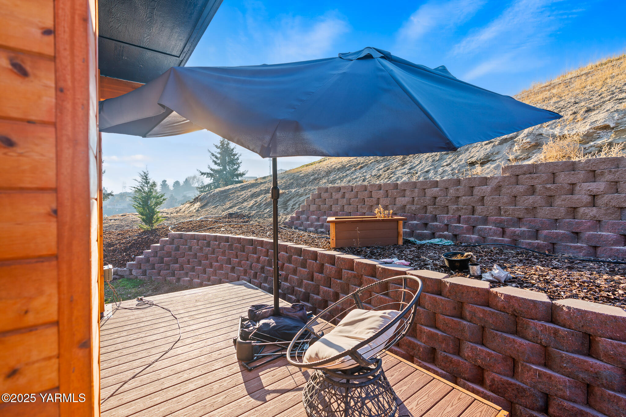 925 Goodlander Circle Selah, WA 98942 - Photo 32 of 43 a patio with glass top table and chairs