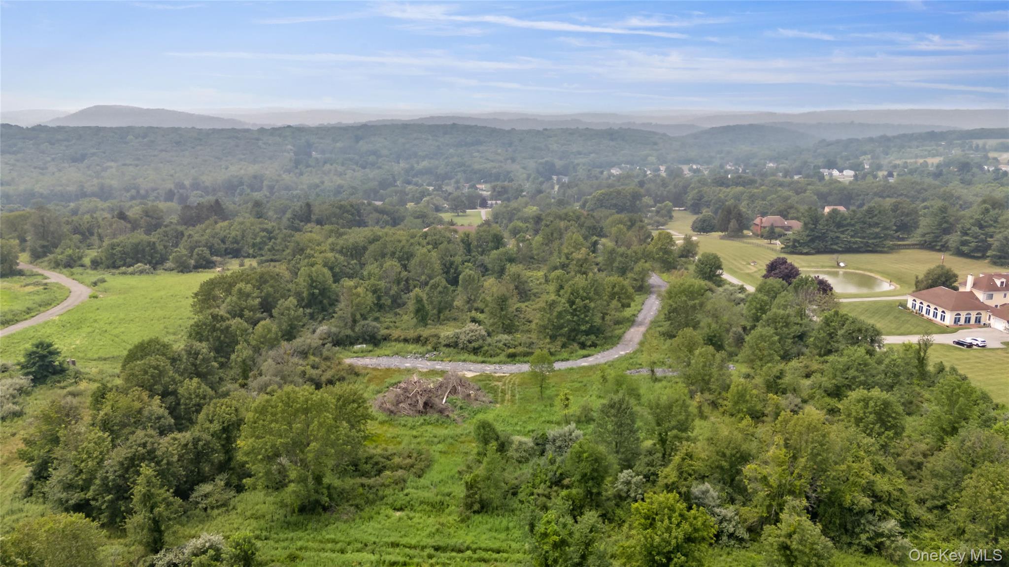 South Smith Road LaGrangeville, NY 12540 - Photo 6 of 9 a view of a city with lush green forest