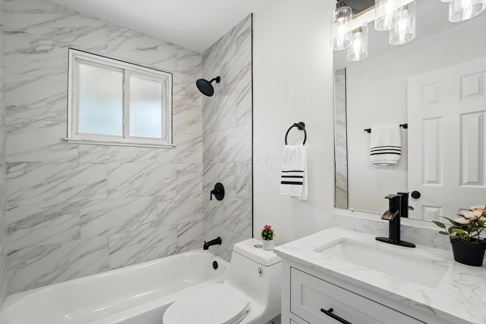 273 East Alcott Road Columbus, OH 43207 - Photo 25 of 36 Updated Bathroom with beautiful tile