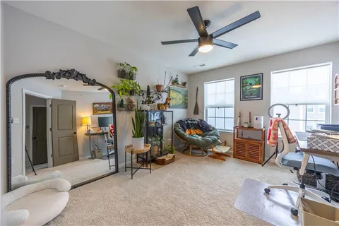 a room with furniture and gym equipment