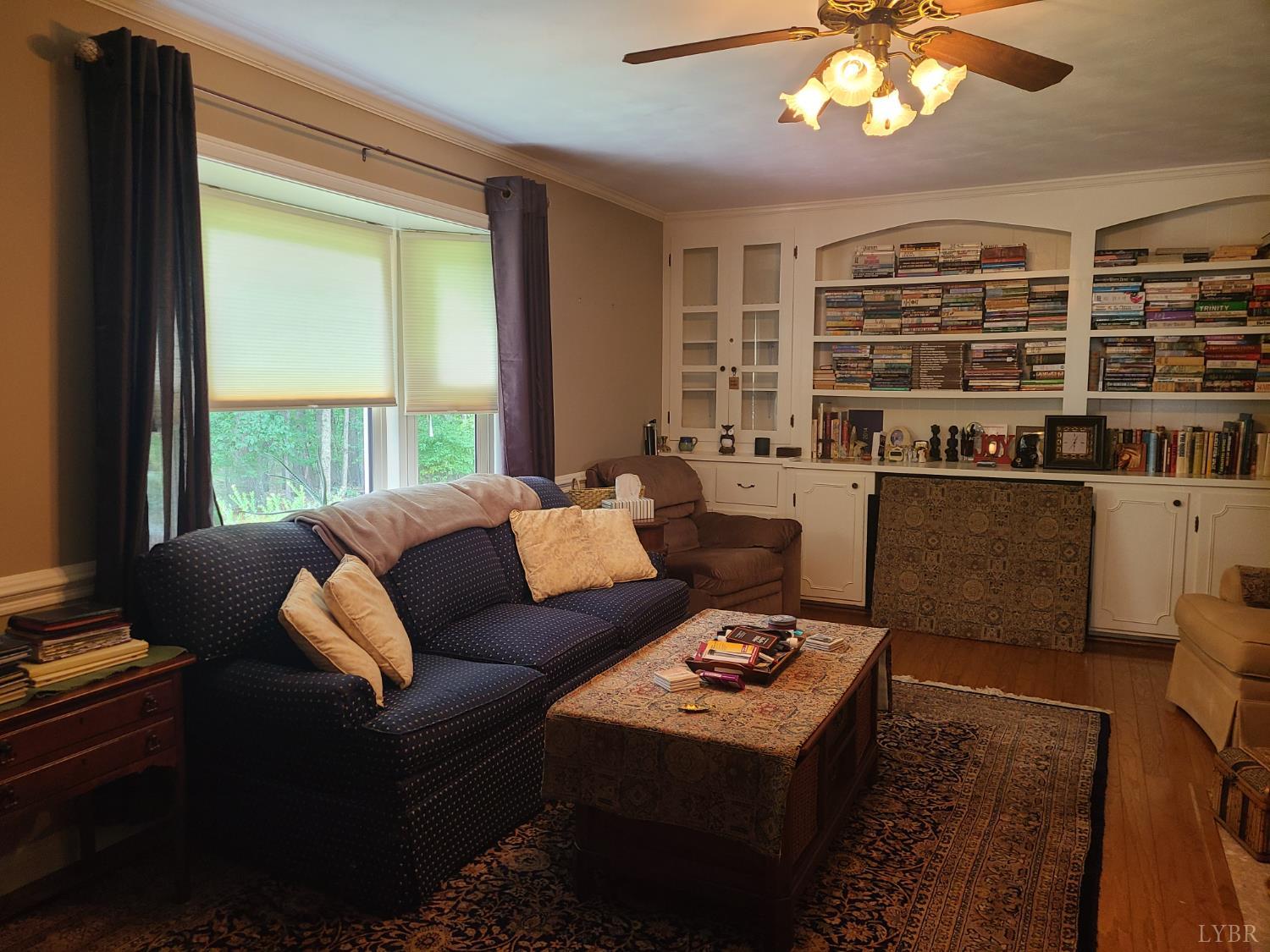 733 Morning Star Road Appomattox, VA 24522 - Photo 19 of 33 a living room with furniture and a large window
