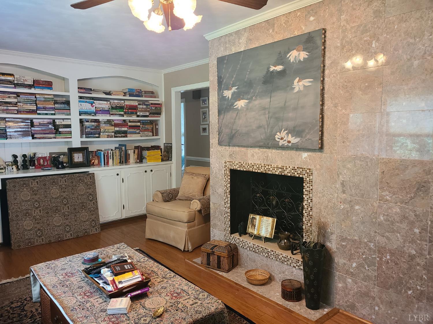 733 Morning Star Road Appomattox, VA 24522 - Photo 20 of 33 a living room with furniture and a fireplace