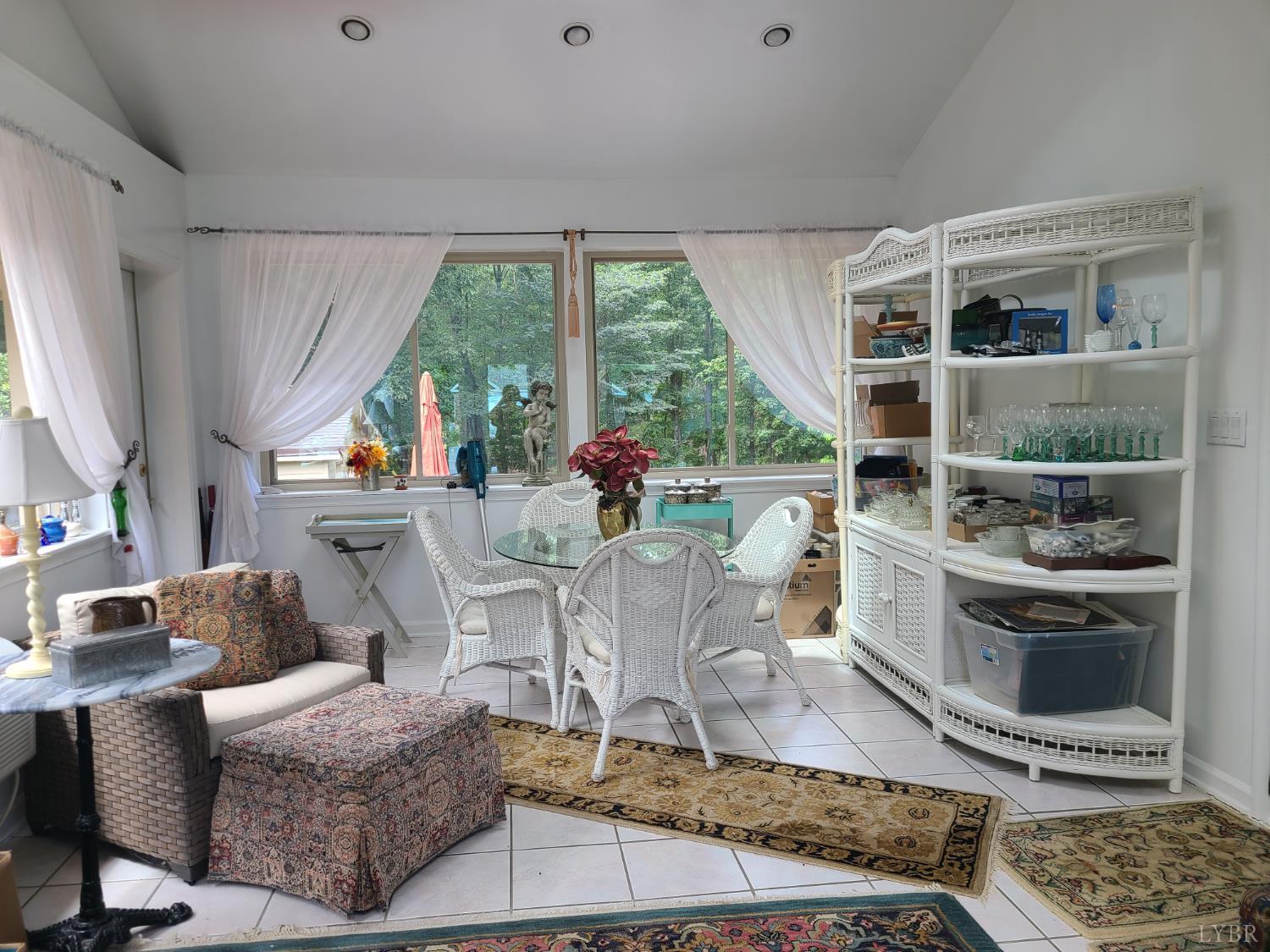 733 Morning Star Road Appomattox, VA 24522 - Photo 21 of 33 a living room with furniture a rug and a large window