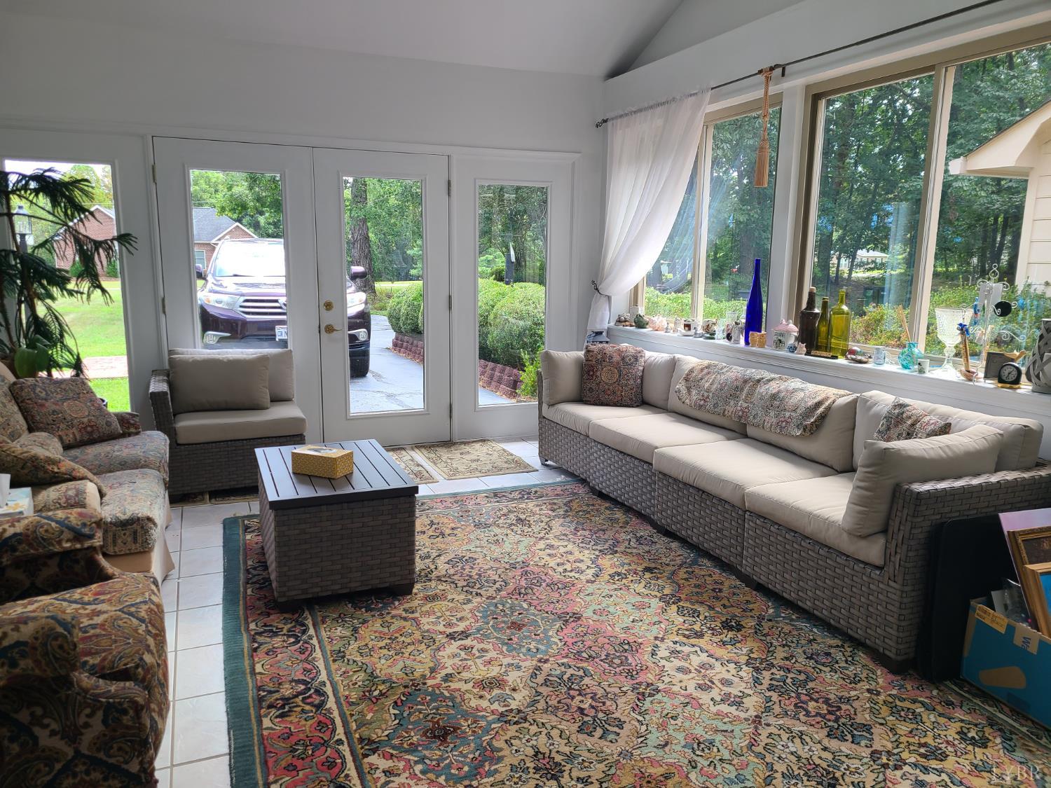 733 Morning Star Road Appomattox, VA 24522 - Photo 22 of 33 a living room with furniture and a large window
