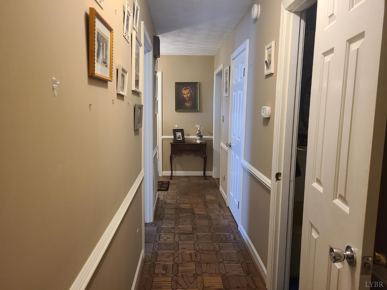733 Morning Star Road Appomattox, VA 24522 - Photo 24 of 33 a view of a hallway with a livingroom and furniture