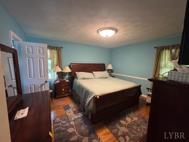 733 Morning Star Road Appomattox, VA 24522 - Photo 25 of 33 a bedroom with a bed and dresser
