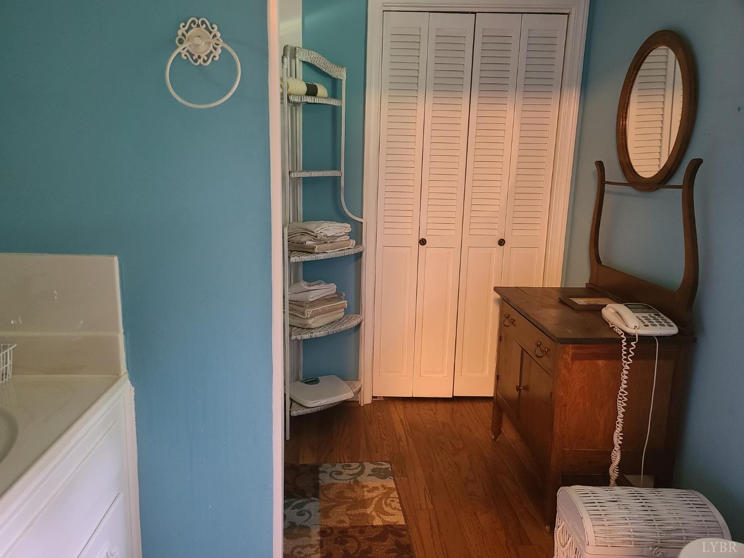 733 Morning Star Road Appomattox, VA 24522 - Photo 28 of 33 a view of washer and dryer with bathroom in the background