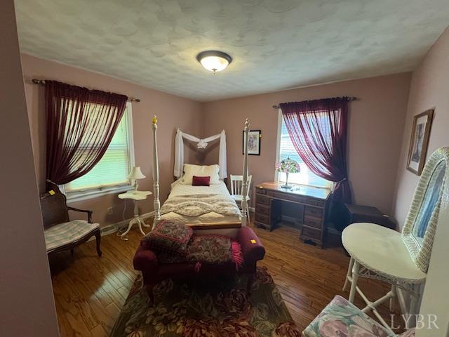 733 Morning Star Road Appomattox, VA 24522 - Photo 29 of 33 a bedroom with a bed window and chair