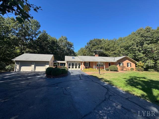 733 Morning Star Road Appomattox, VA 24522 - Photo 4 of 33 a front view of a house with a yard