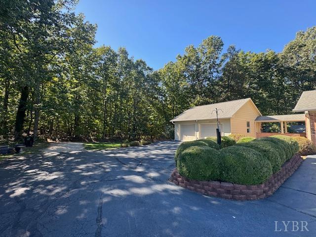733 Morning Star Road Appomattox, VA 24522 - Photo 10 of 33 a view of a small house with a yard