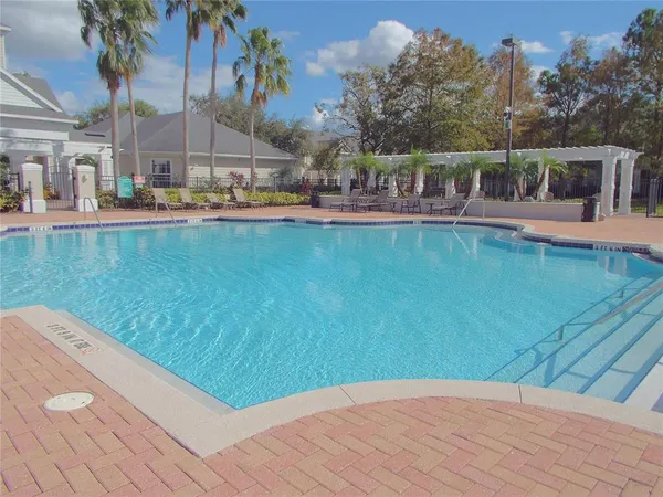 a view of a house with a swimming pool