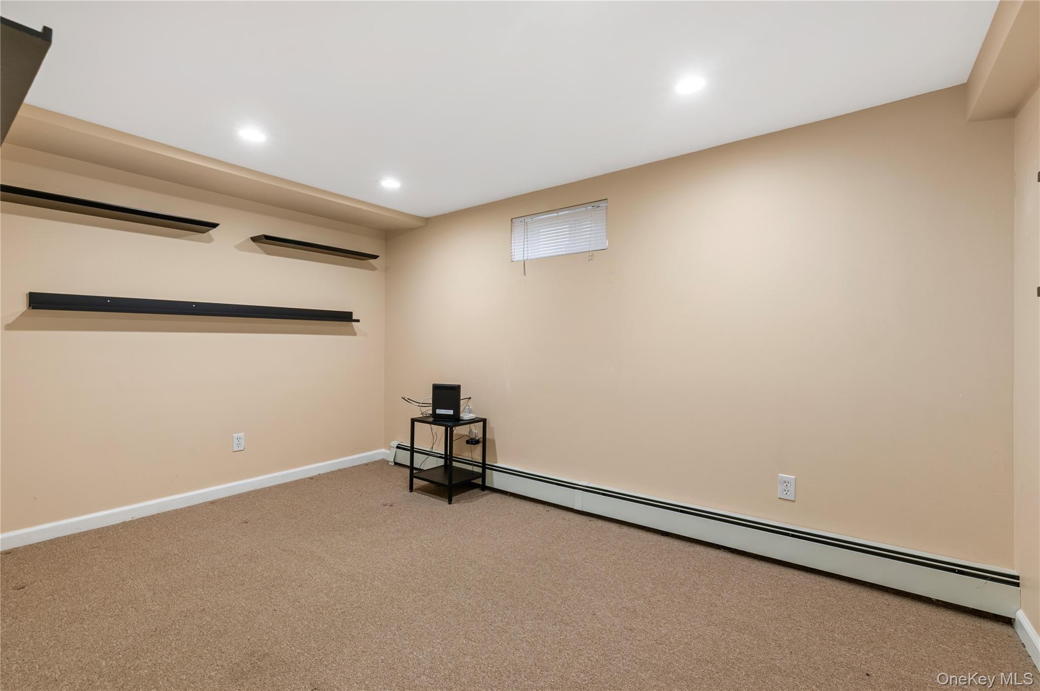 3 Cheshire Road Bethpage, NY 11714 - Photo 22 of 26 a view of room with air conditioner and window