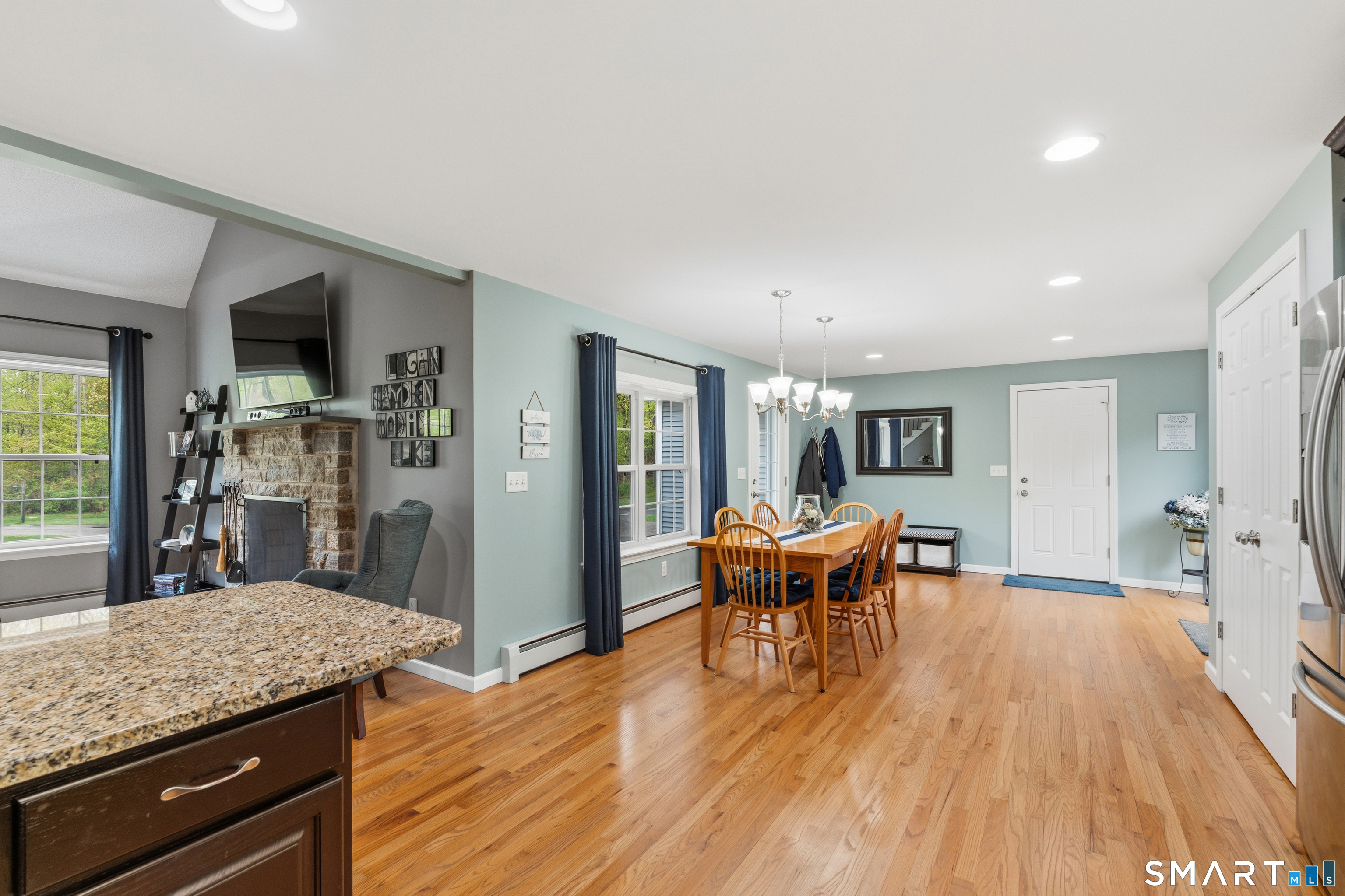 362 Turnpike Road Ashford, CT 06278 - Photo 18 of 40 a view of a dining room with furniture and wooden floor