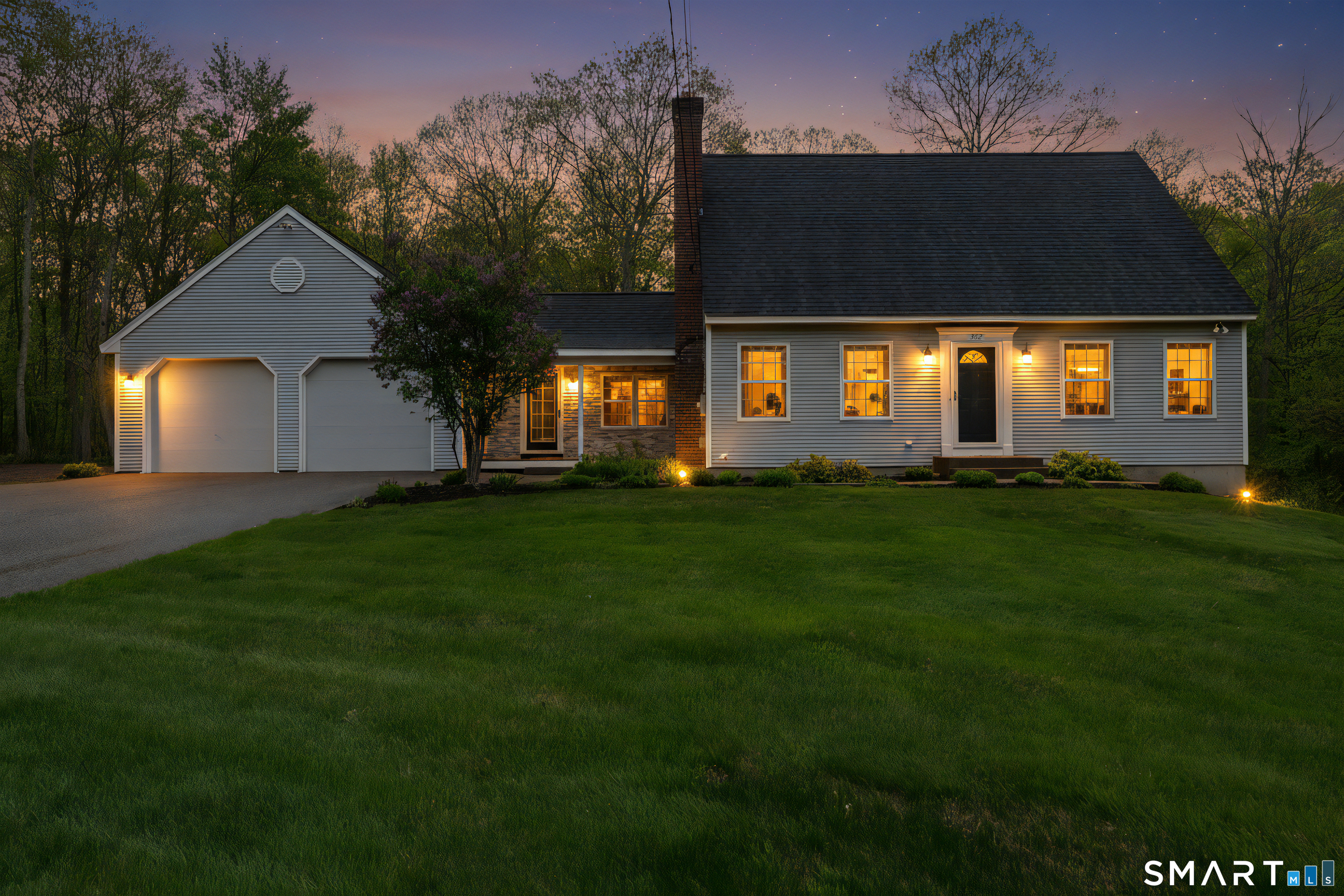 362 Turnpike Road Ashford, CT 06278 - Photo 2 of 40 a front view of a house with a garden and yard