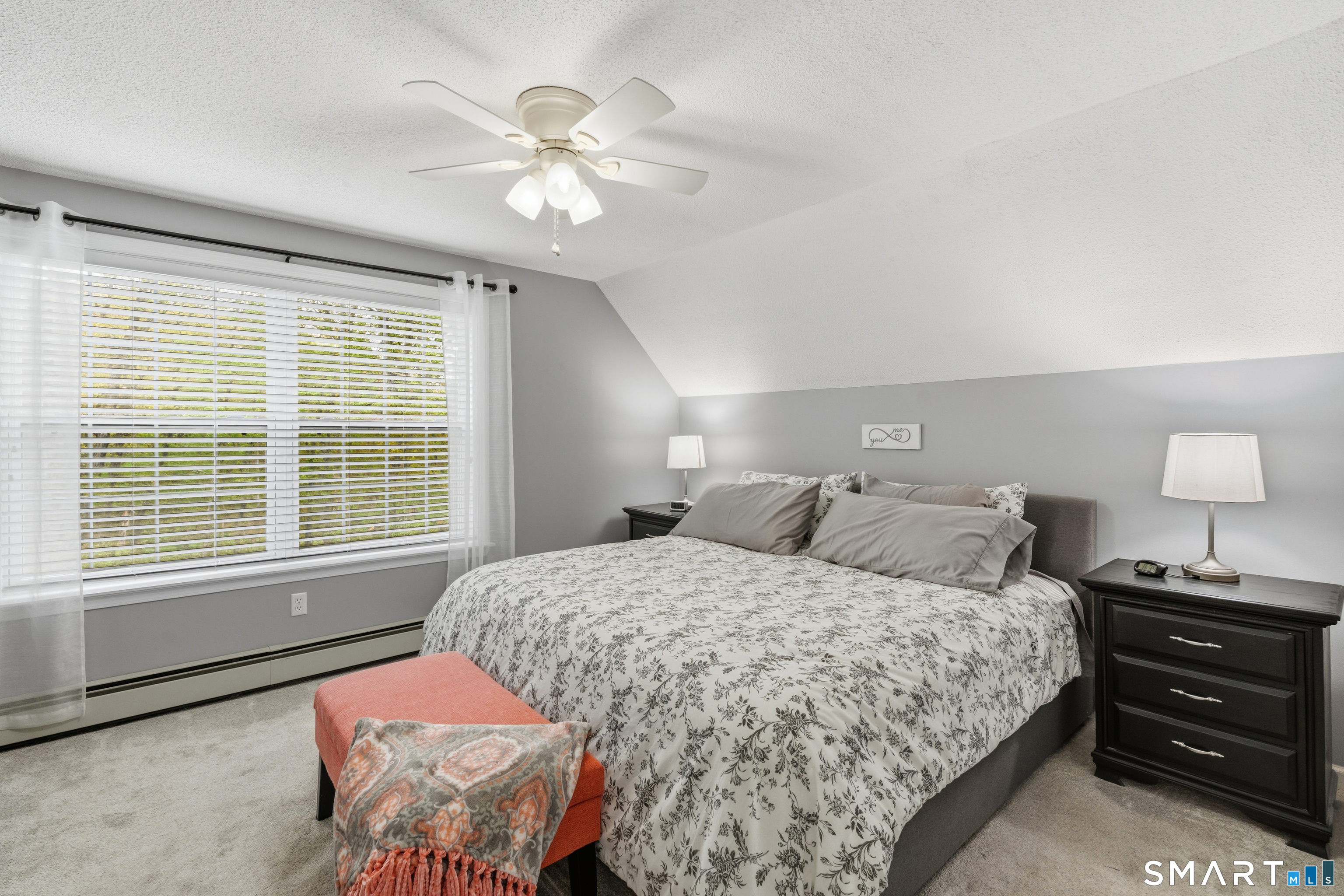 362 Turnpike Road Ashford, CT 06278 - Photo 24 of 40 a bedroom with a bed and a chandelier