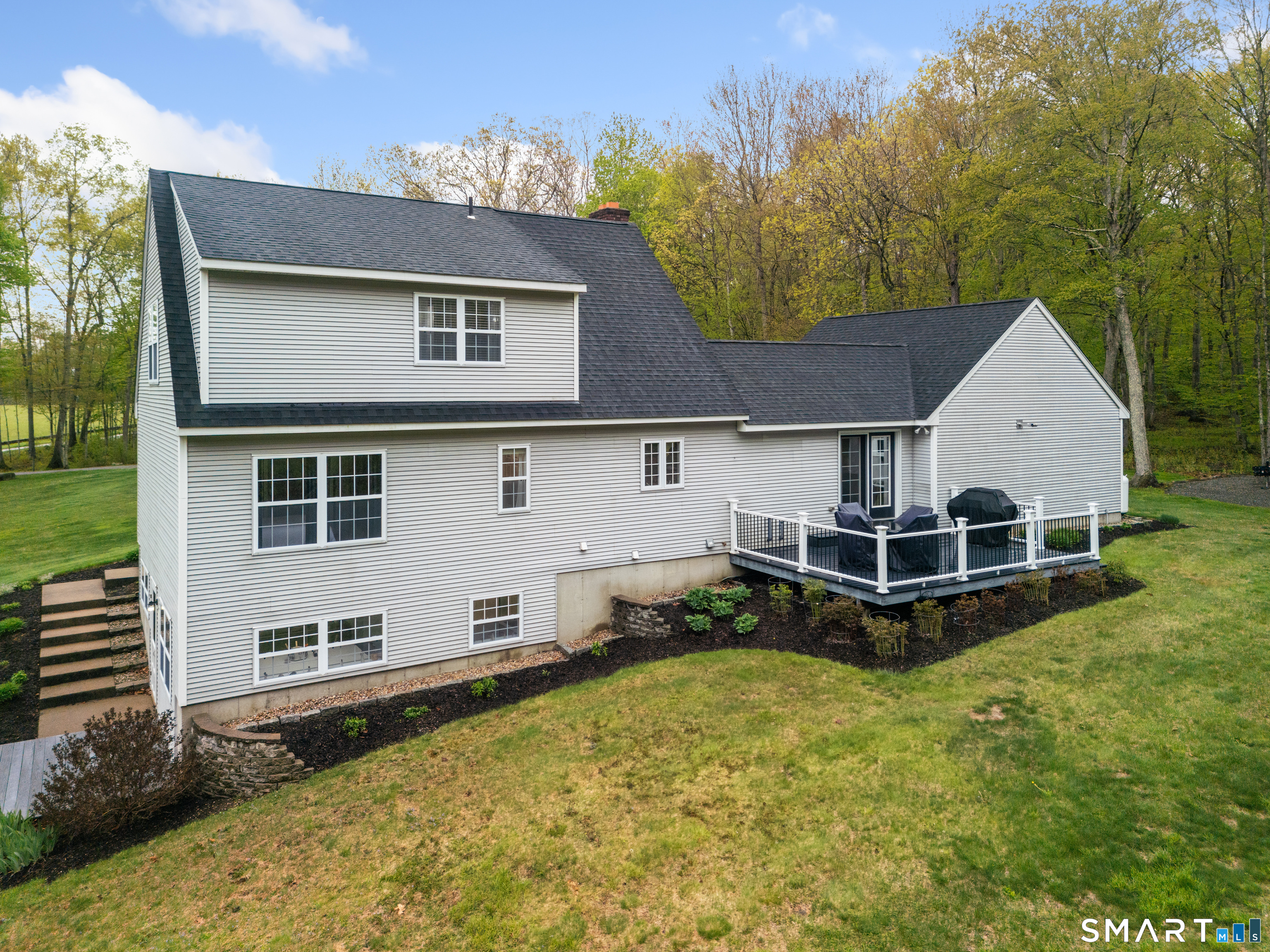 362 Turnpike Road Ashford, CT 06278 - Photo 5 of 40 a view of a house with a yard and sitting area