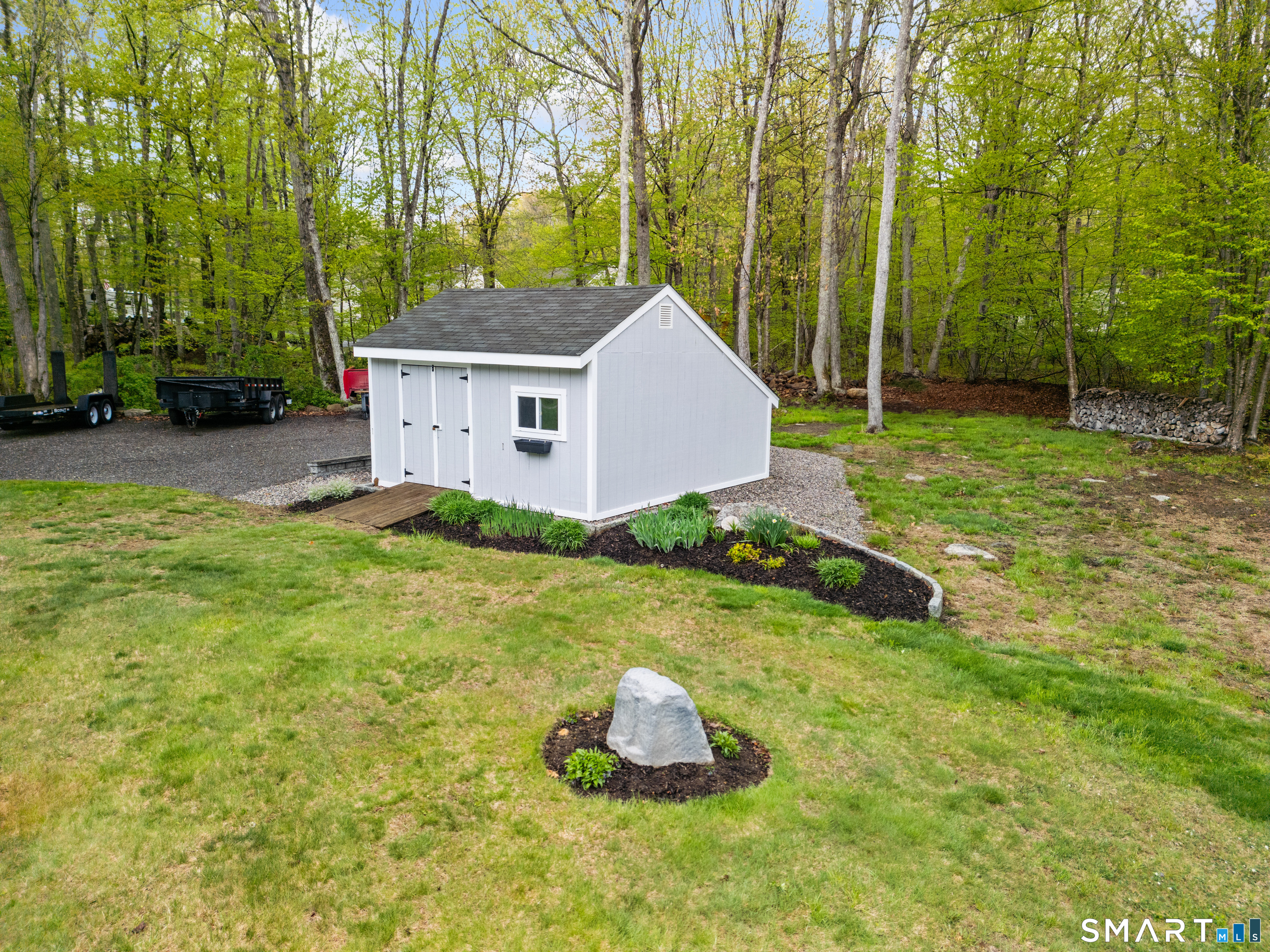 362 Turnpike Road Ashford, CT 06278 - Photo 8 of 40 a house is sitting in middle of the green field