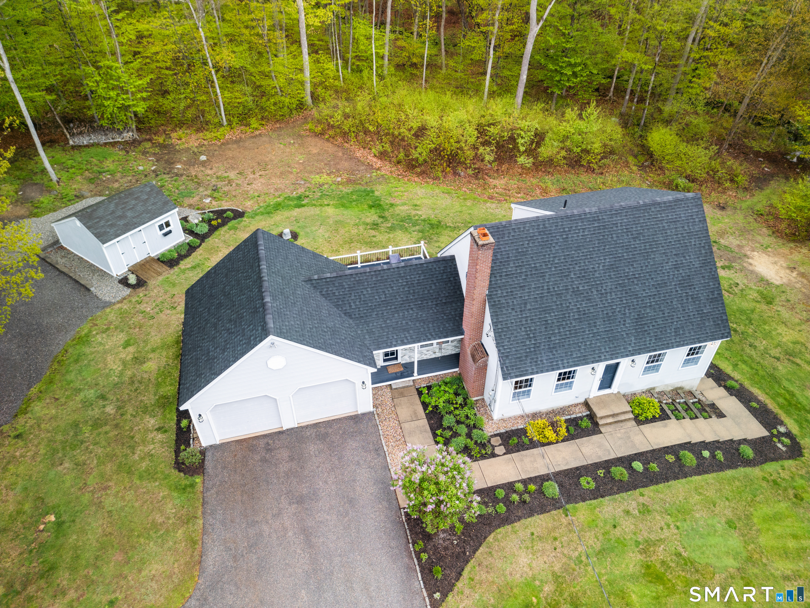 362 Turnpike Road Ashford, CT 06278 - Photo 9 of 40 an aerial view of a house with a yard and trees
