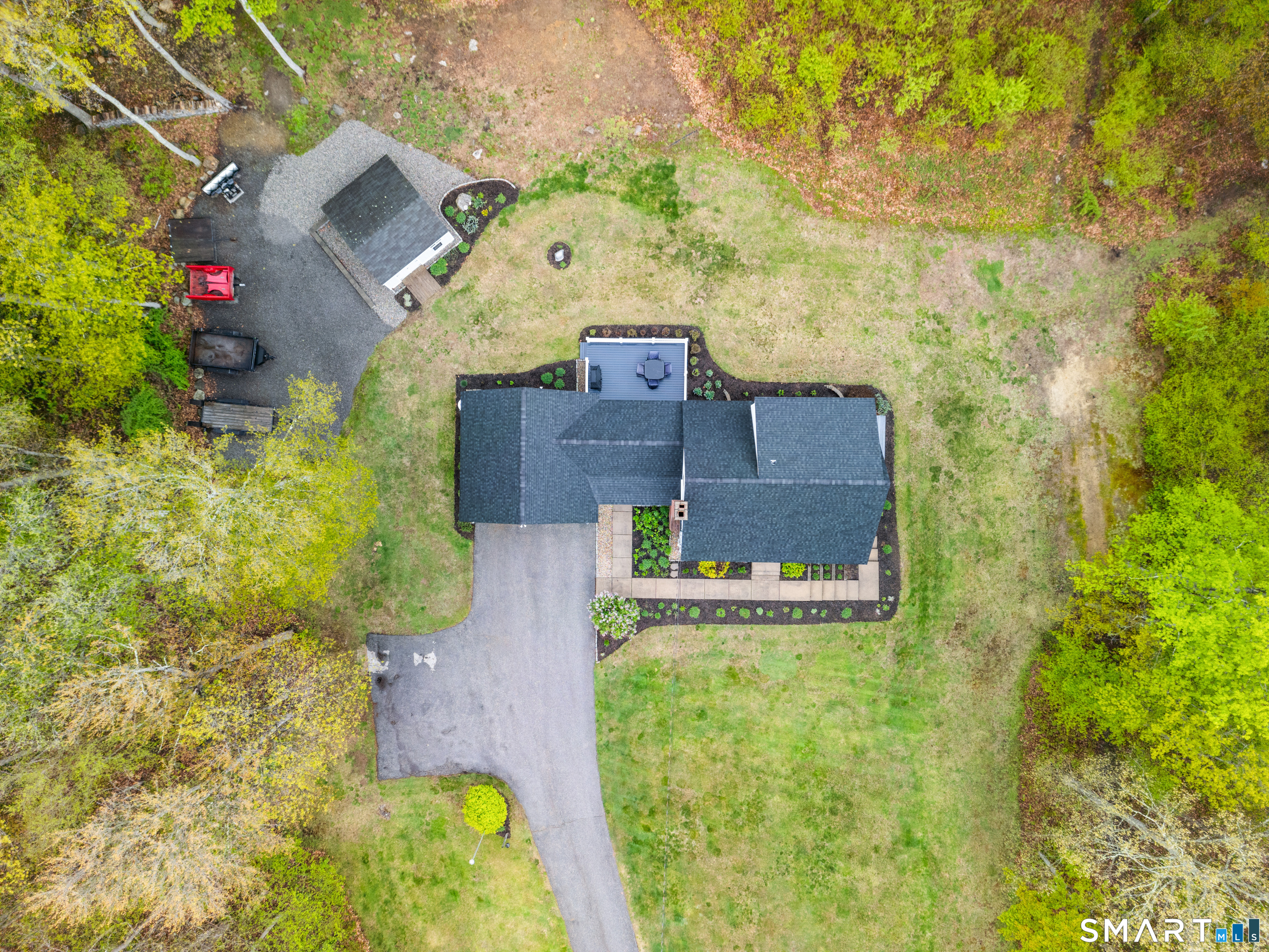 362 Turnpike Road Ashford, CT 06278 - Photo 10 of 40 an aerial view of a house with a yard and garden