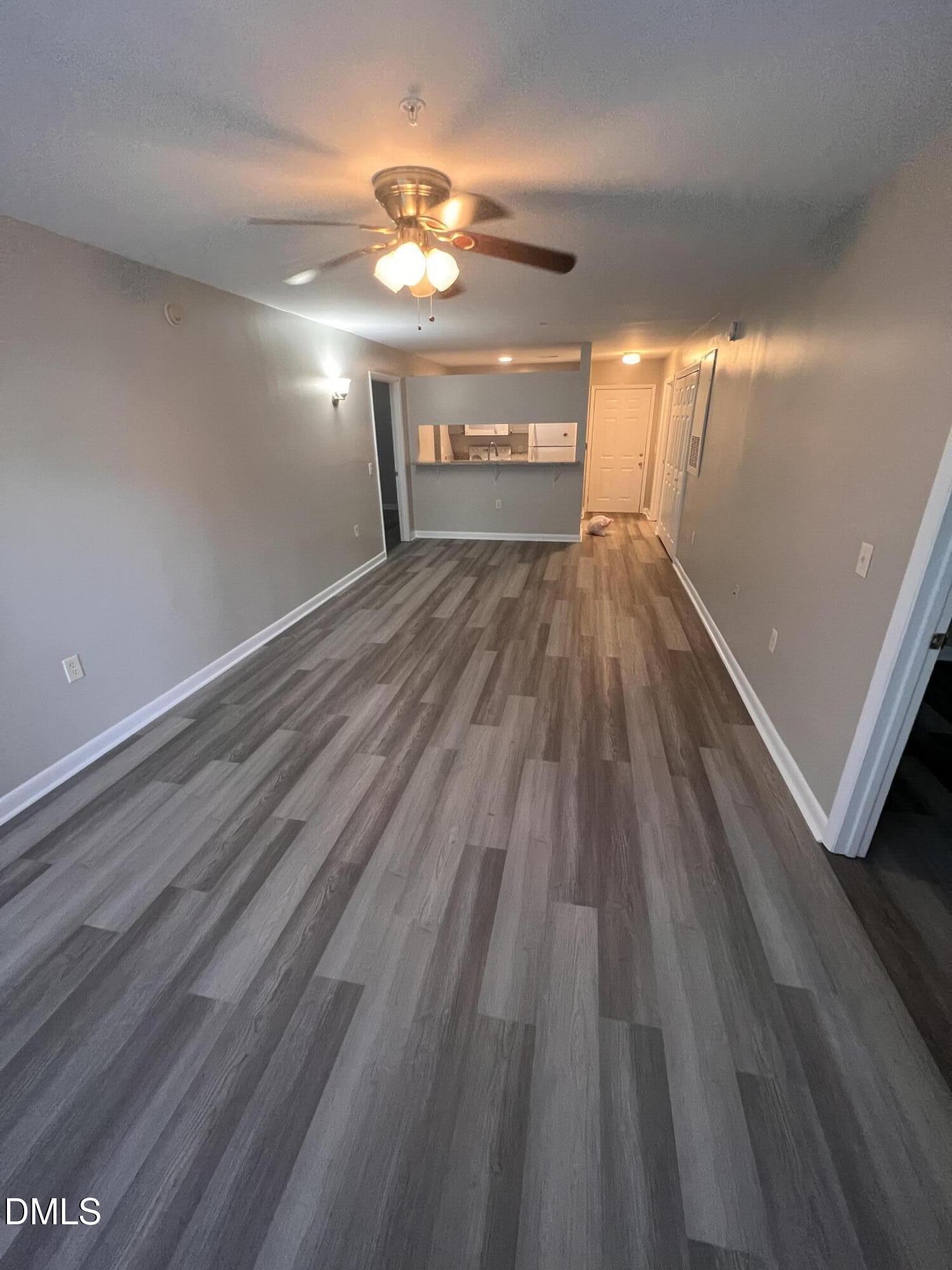 1431 Collegiate Circle, Unit 101 Raleigh, NC 27606 - Photo 3 of 11 a view of gallery with wooden floor