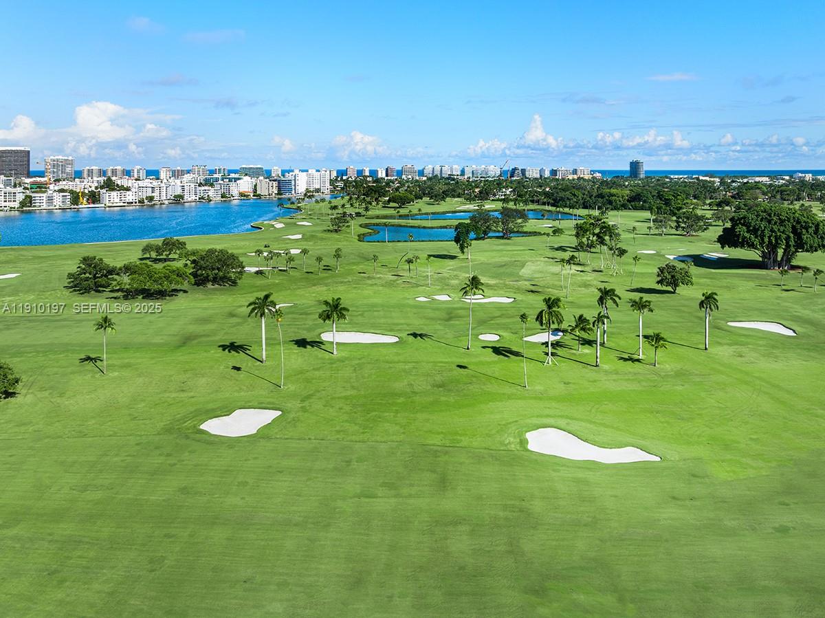 7 Indian Creek Island Road Miami Beach, FL 33154 - Photo 23 of 24 a view of a golf course with a lake