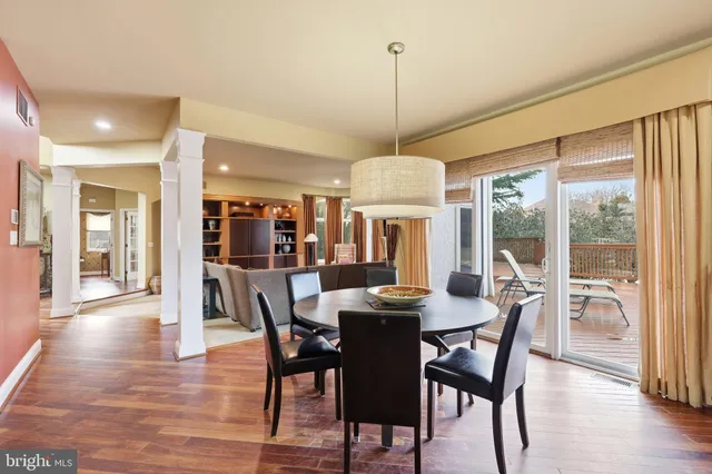 a open kitchen with stainless steel appliances granite countertop a stove and refrigerator