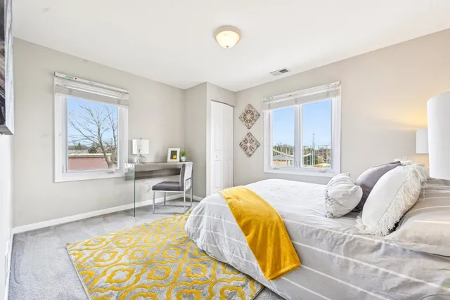 a view of a wall with a painting on the wall