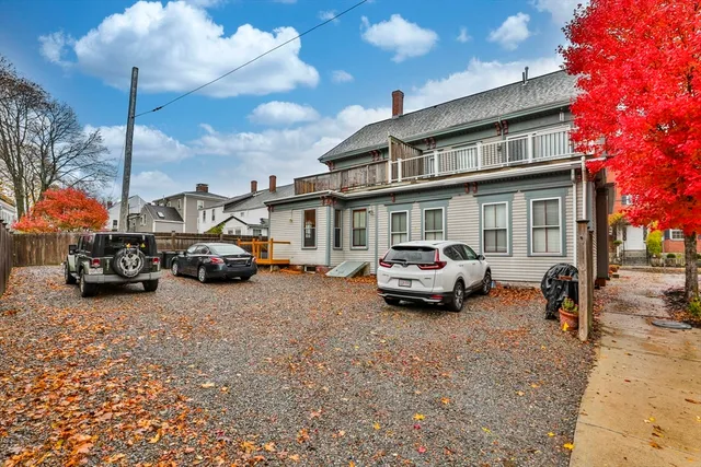 a car parked in front of a house