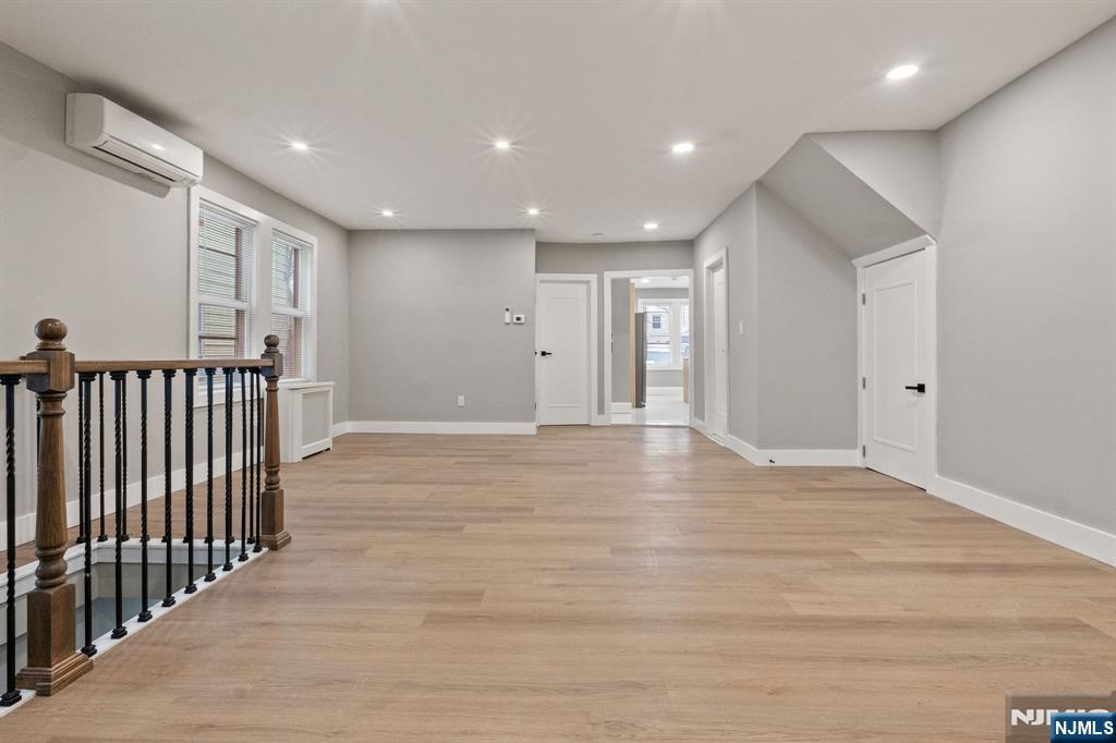 76 Mission Street Montclair, NJ 07042 - Photo 8 of 50 a view of an empty room with wooden floor