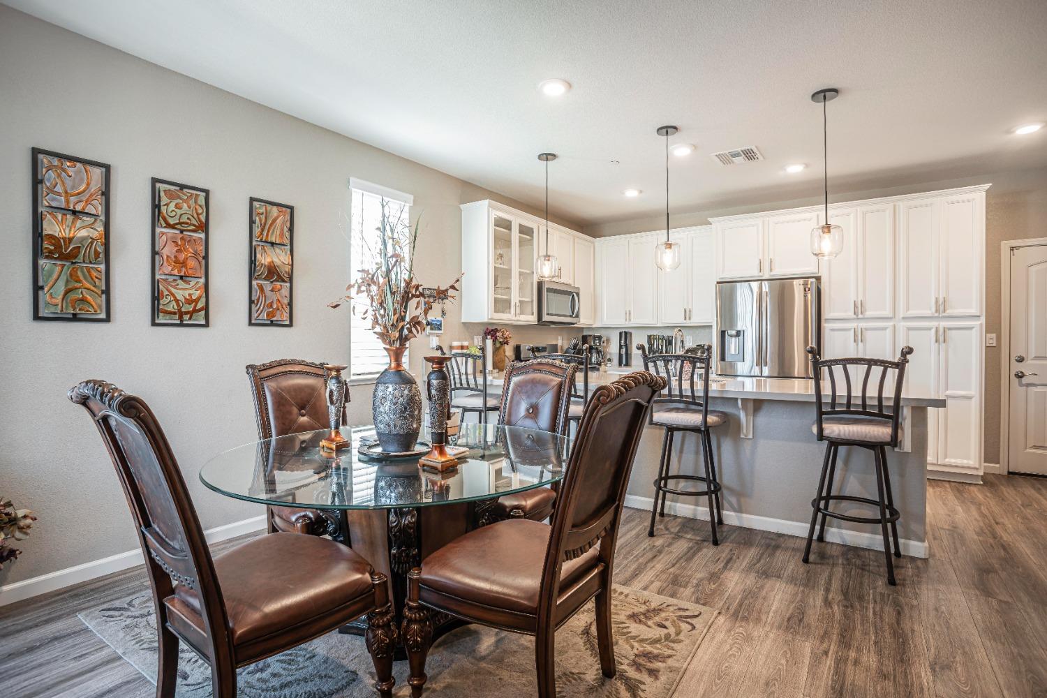 2510 Natomas Crossing Drive Sacramento, CA 95834 - Photo 11 of 34 a view of a dining room with furniture