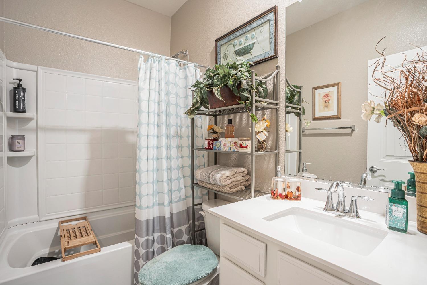 2510 Natomas Crossing Drive Sacramento, CA 95834 - Photo 22 of 34 a bathroom with a sink toilet and shower