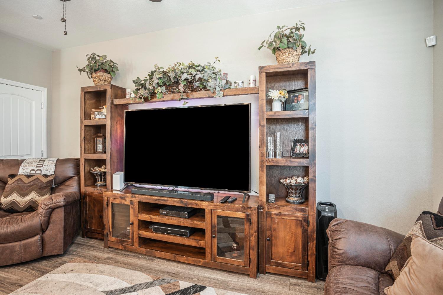 2510 Natomas Crossing Drive Sacramento, CA 95834 - Photo 5 of 34 a living room with furniture and a flat screen tv