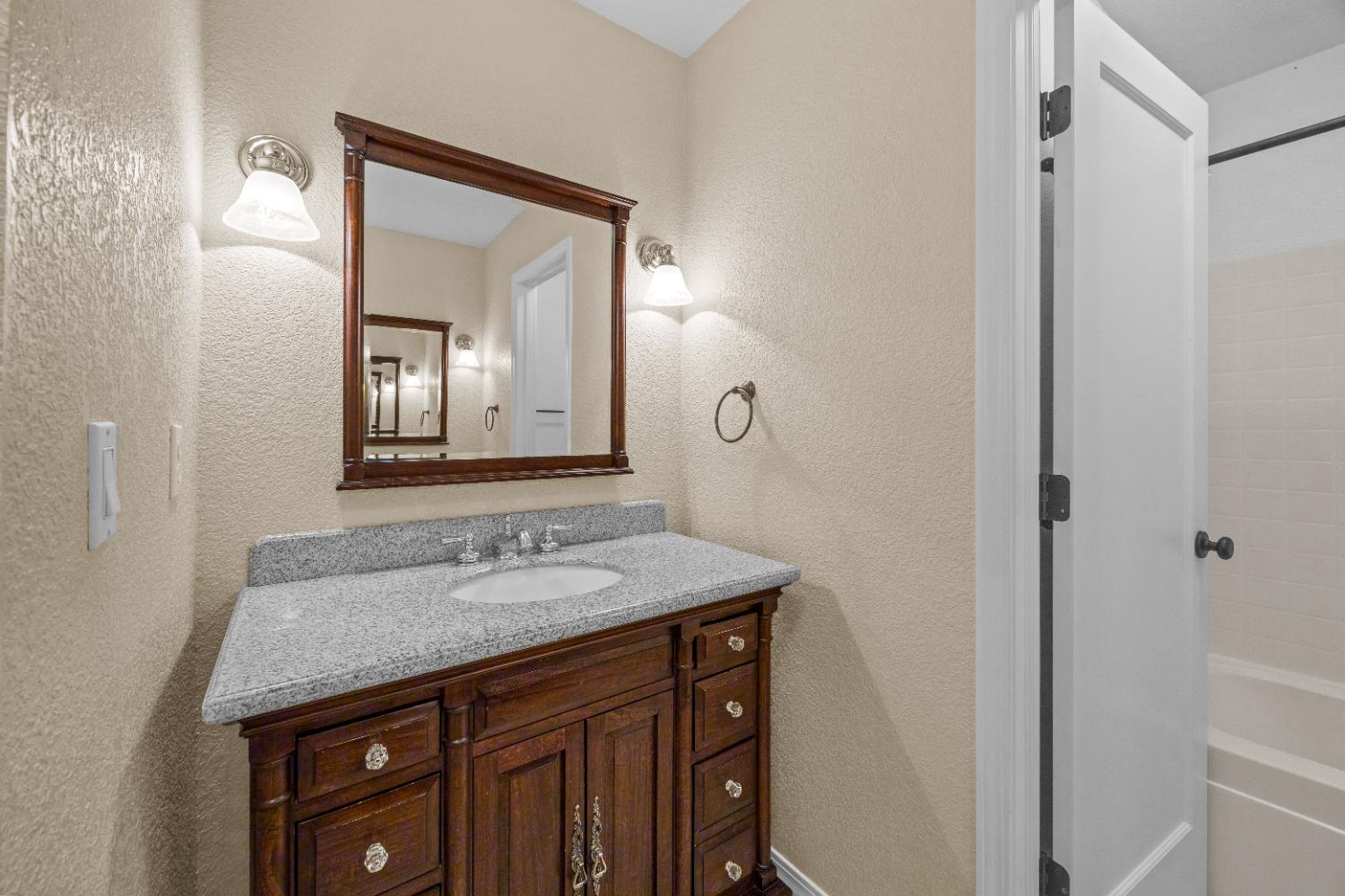 18450 Sugar Loaf Road Jackson, CA 95642 - Photo 27 of 58 second story full bathroom with dual vanities