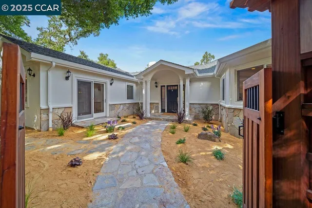 a view of a house with a garage