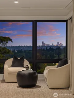 a spacious bathroom with a double vanity sink and a mirror