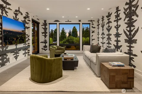 a view of a room with a table and chairs