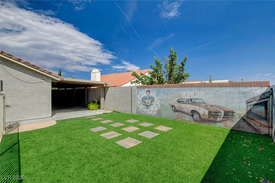 1118 Olmo Way Boulder City, NV 89005 - Photo 30 of 45 Fenced backyard with a patio