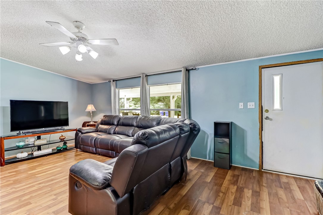 86064 Jones Road Yulee, FL 32097 - Photo 6 of 25 a living room with furniture and a flat screen tv