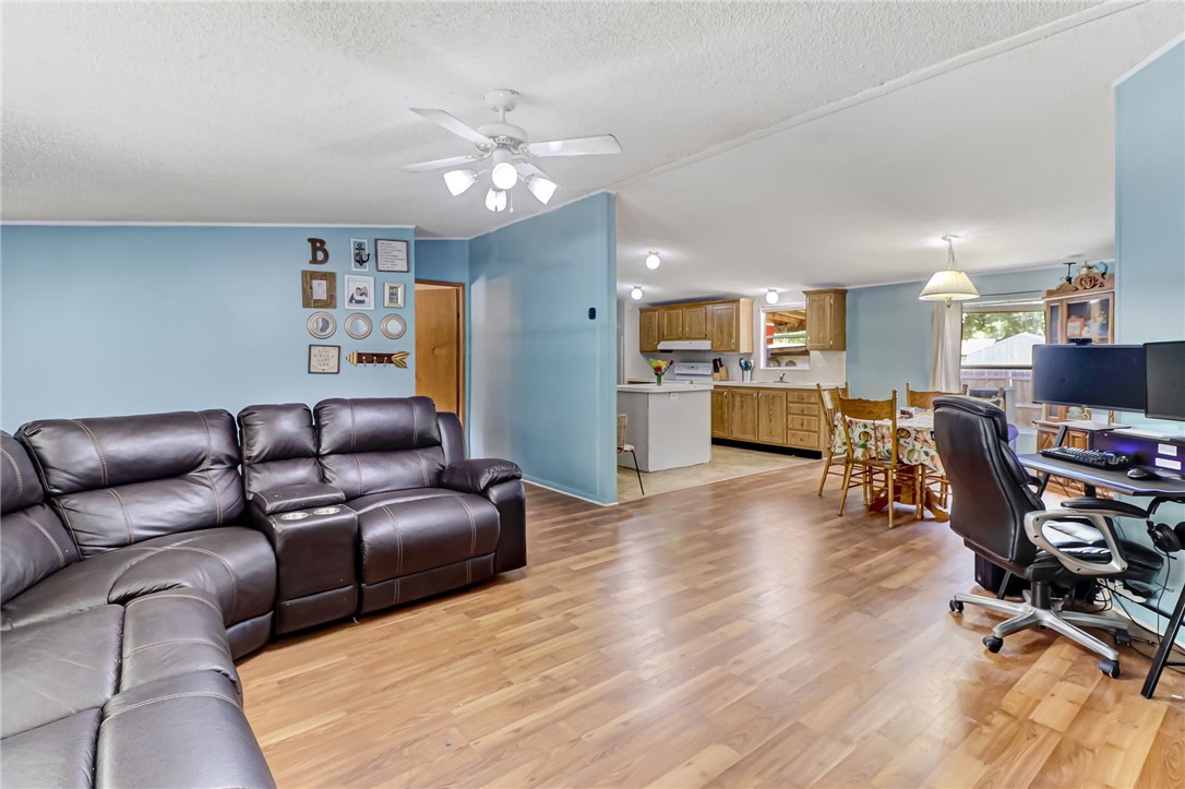 86064 Jones Road Yulee, FL 32097 - Photo 8 of 25 a living room with furniture and kitchen area