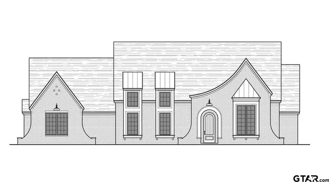 a view of a house with white walls