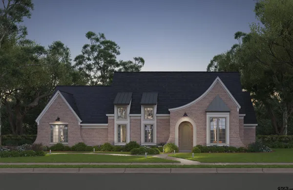 a front view of a house with a garden and trees